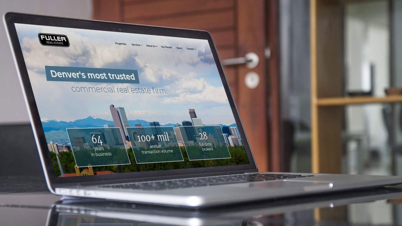 Fuller real estate website on a laptop